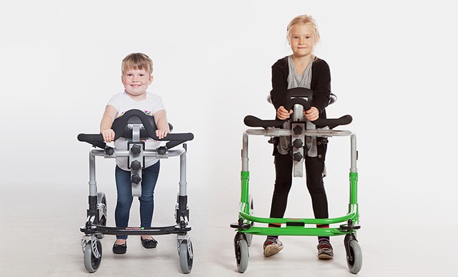 Children standing in gait trainers - two sizes